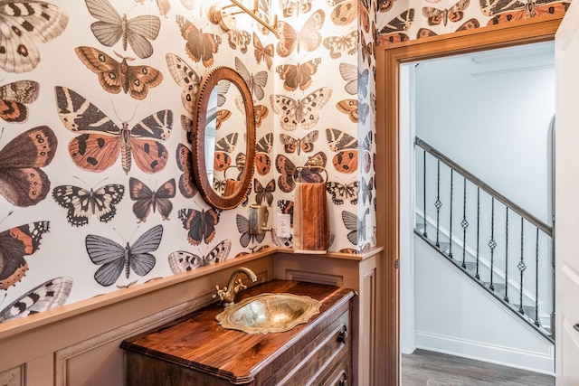 bathroom with vanity and wood-type flooring