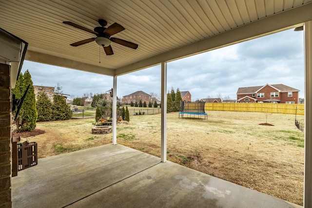 view of patio / terrace featuring ceiling fan and a trampoline