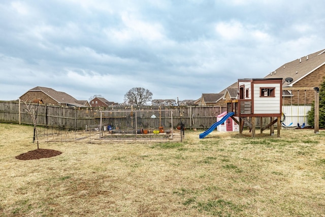 view of jungle gym featuring a yard