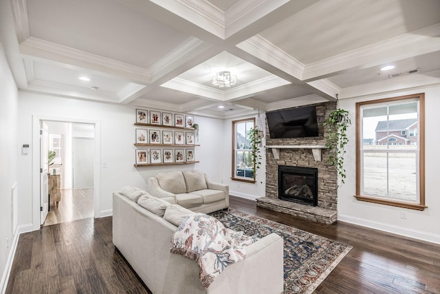 living room with dark wood-type flooring, plenty of natural light, and beam ceiling