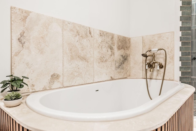 bathroom with a washtub