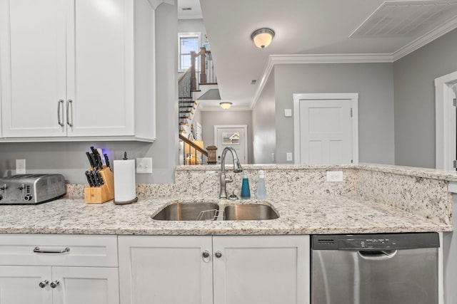 kitchen with white cabinetry, dishwasher, sink, and light stone countertops