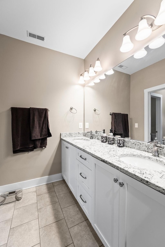 bathroom featuring vanity and tile patterned floors