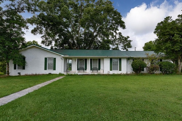 ranch-style home with a front yard