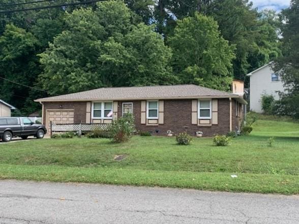 view of front of home with a front yard