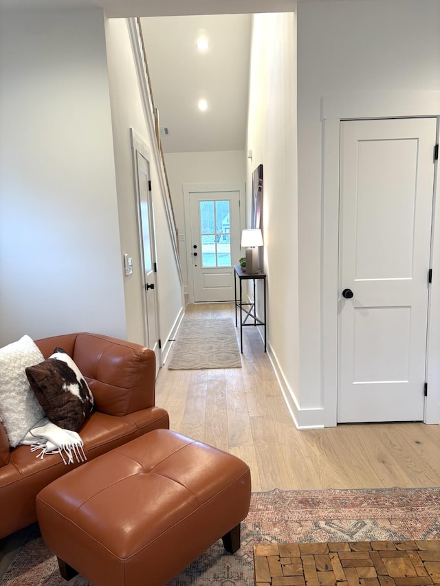 hallway featuring light wood-type flooring