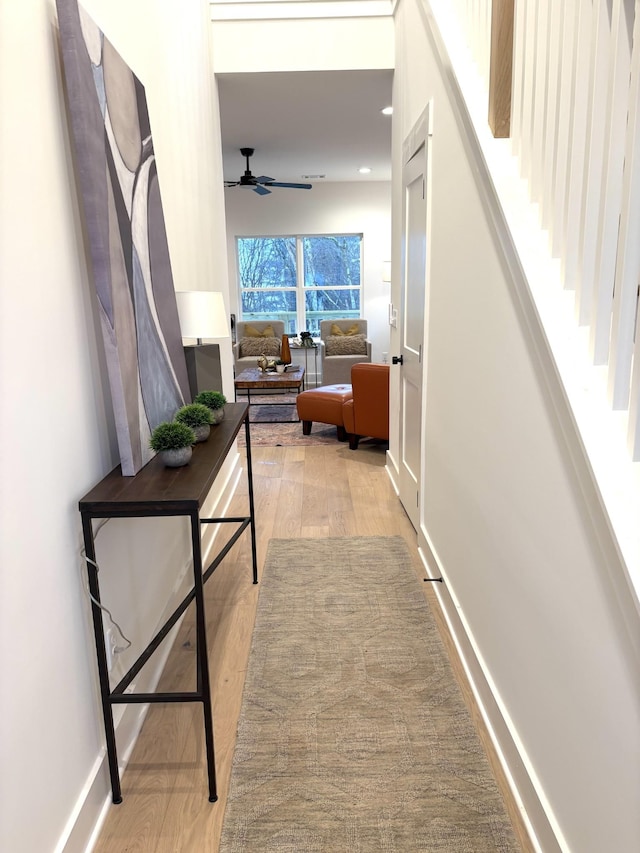 hallway featuring hardwood / wood-style flooring