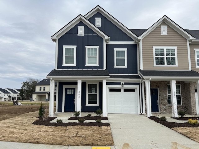 view of front of property with a garage