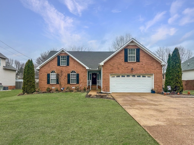 front facade with a garage and a front lawn