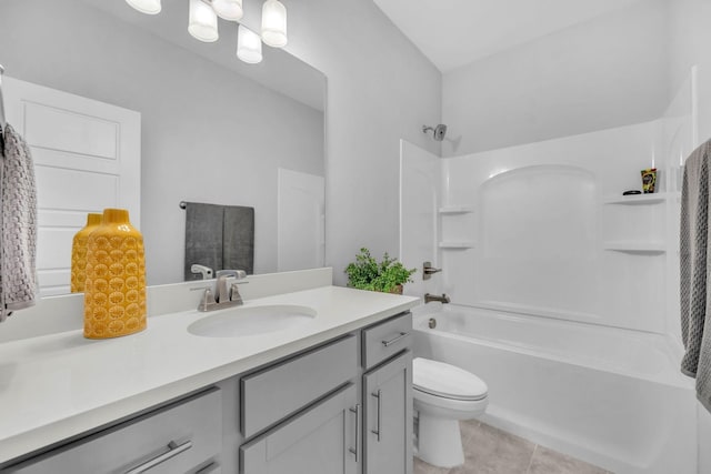 full bathroom featuring tile patterned floors, vanity, toilet, and tub / shower combination