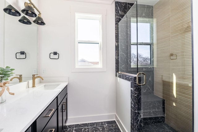 bathroom with vanity and walk in shower