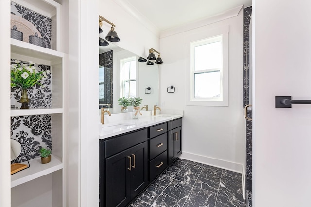 bathroom featuring vanity, a wealth of natural light, and ornamental molding