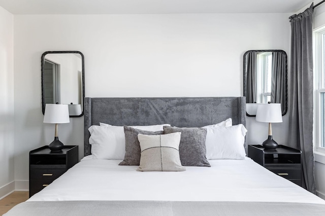 bedroom featuring hardwood / wood-style floors