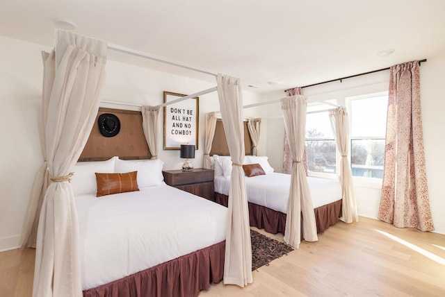 bedroom featuring light wood-type flooring