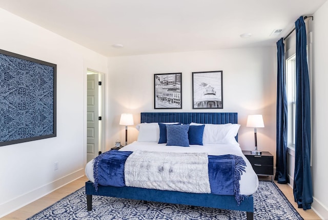 bedroom featuring light hardwood / wood-style flooring