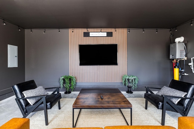 interior space with electric panel, tankless water heater, and concrete floors