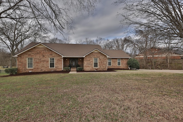 ranch-style home with a front yard