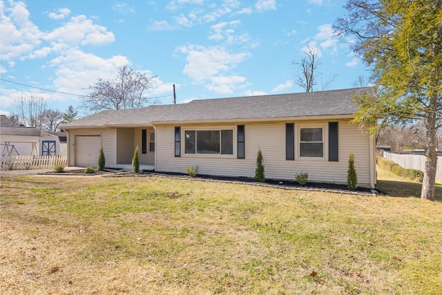 ranch-style home with a garage and a front yard