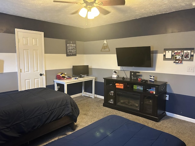 carpeted bedroom with a textured ceiling