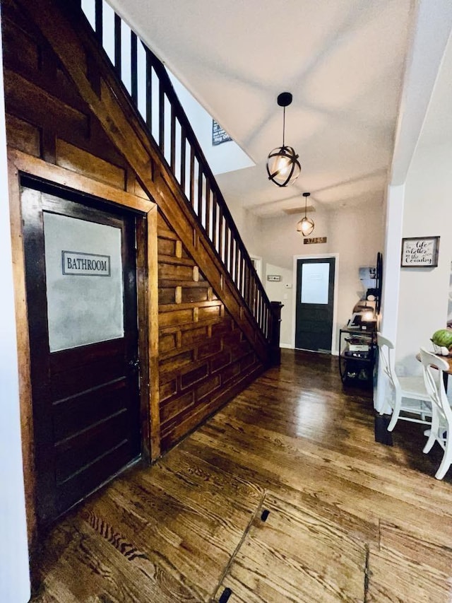 entrance foyer featuring dark hardwood / wood-style floors