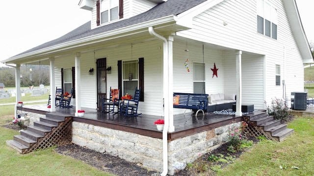 exterior space featuring central AC unit and covered porch