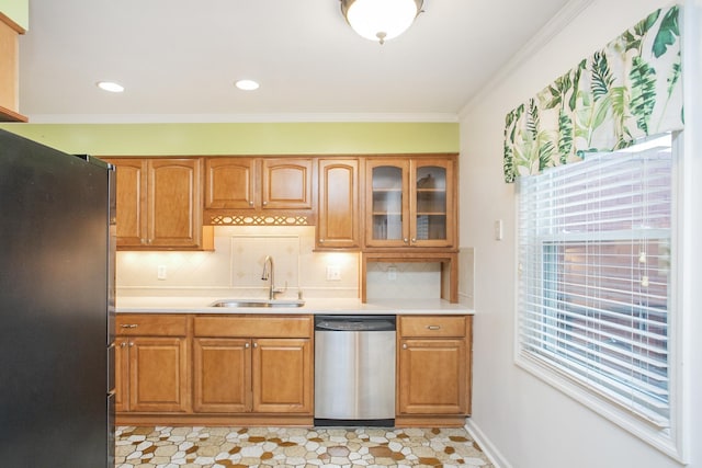 kitchen with sink, dishwasher, refrigerator, ornamental molding, and decorative backsplash