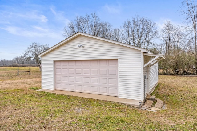 garage with a yard