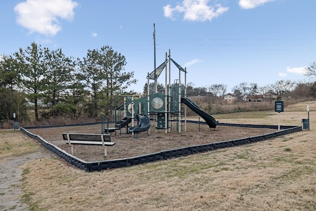 view of jungle gym with a yard