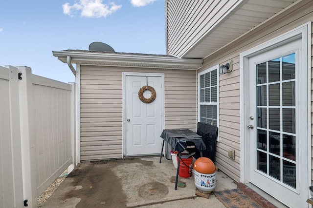 doorway to property featuring a patio area