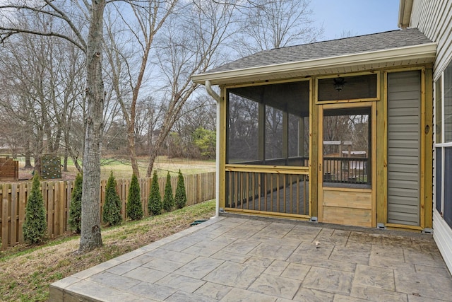 view of patio with a sunroom