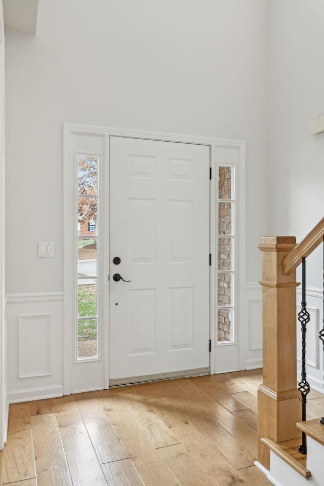 foyer with light hardwood / wood-style flooring