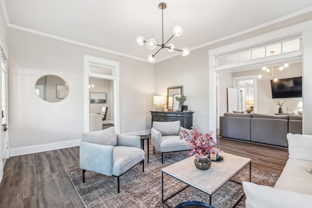 living room featuring crown molding, dark hardwood / wood-style floors, and a chandelier