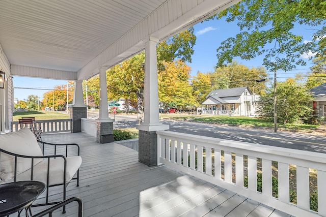 wooden terrace with covered porch