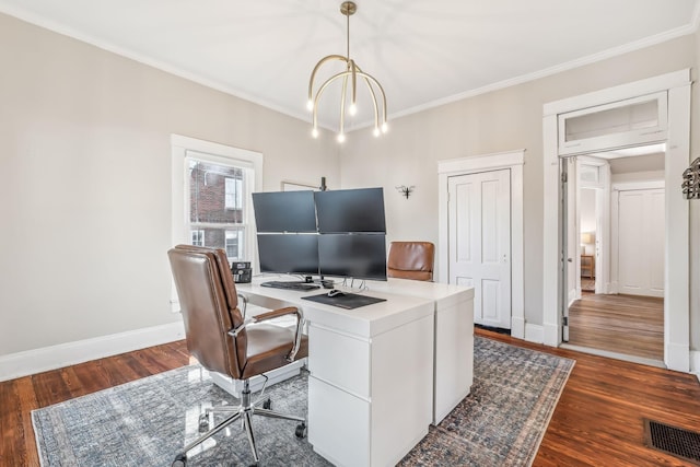 office area with a notable chandelier, ornamental molding, and dark hardwood / wood-style floors