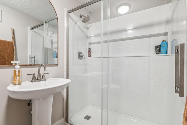 bathroom with an enclosed shower