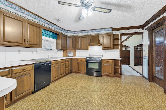 kitchen featuring premium range hood, sink, a textured ceiling, ornamental molding, and black appliances