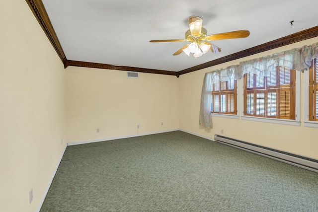 empty room featuring baseboard heating, ceiling fan, carpet flooring, and crown molding