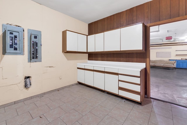 clothes washing area with electric panel