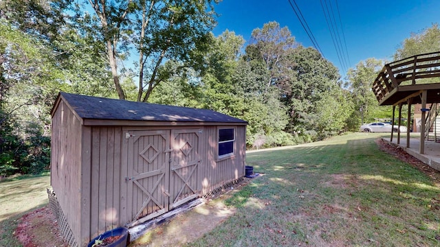 view of outdoor structure with a lawn