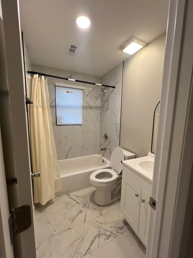 full bathroom with visible vents, shower / bath combo with shower curtain, toilet, marble finish floor, and vanity