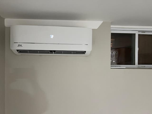 details featuring an AC wall unit