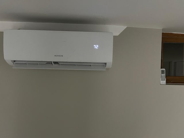 interior details featuring a wall mounted air conditioner