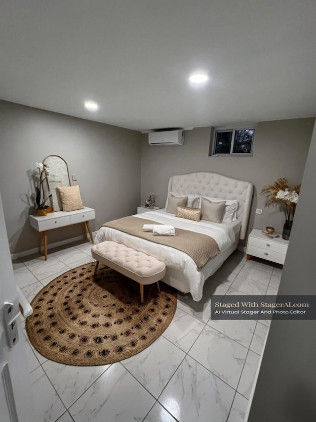 bedroom featuring recessed lighting, marble finish floor, an AC wall unit, and baseboards