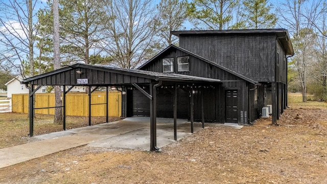 exterior space with a carport