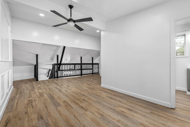 spare room with light hardwood / wood-style flooring and ceiling fan