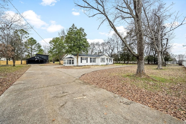 ranch-style home with a carport