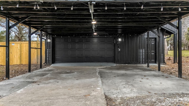 garage featuring a carport