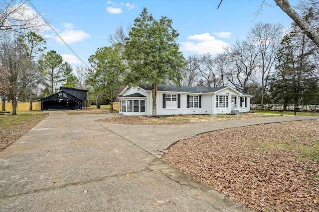 view of front facade featuring a carport