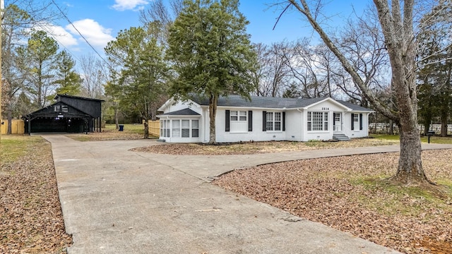 single story home with a carport