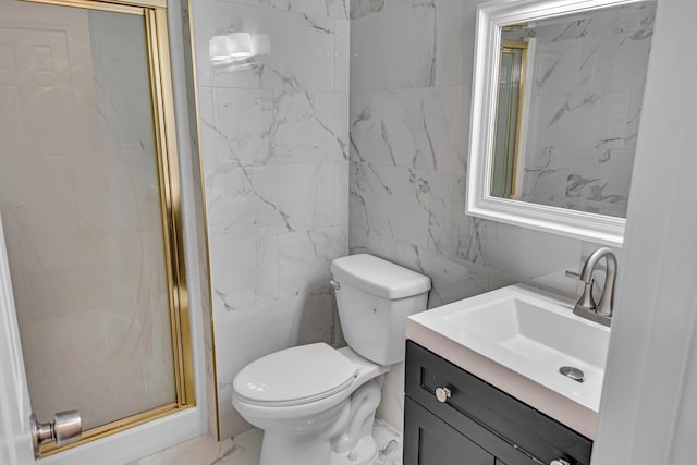 bathroom featuring marble finish floor, toilet, vanity, and a shower stall